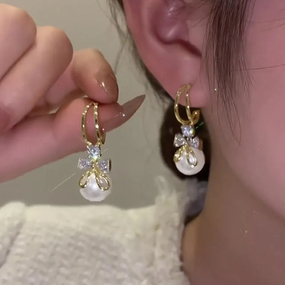  ピアス 韓国 揺れる パールリボンピアス